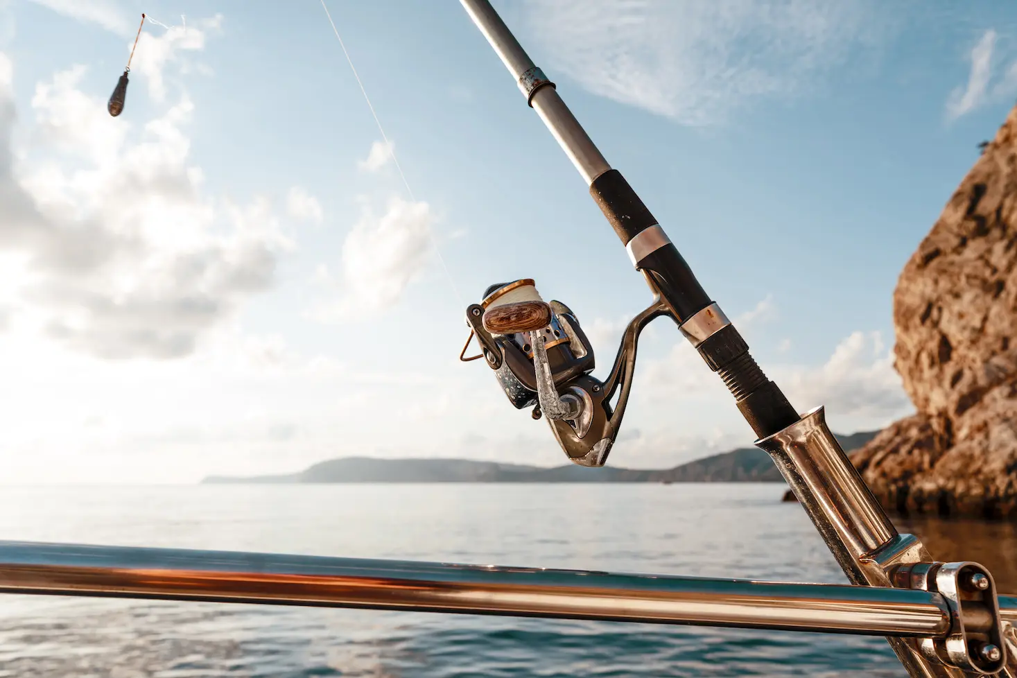 fishing-rod-on-a-sailboat-on-the-background-of-the-2021-09-28-03-17-52-utc